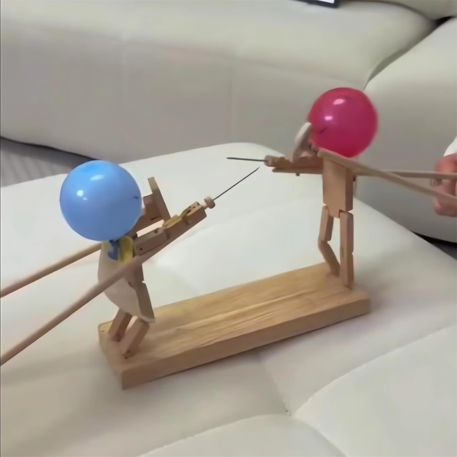 Tictoyo Balloon Popping Game: thrilling objective is to pop the opponent's balloon head.
