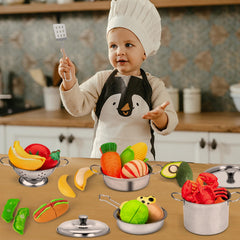TikOnsYol kids imagining cooking with pots and pans in a play kitchen