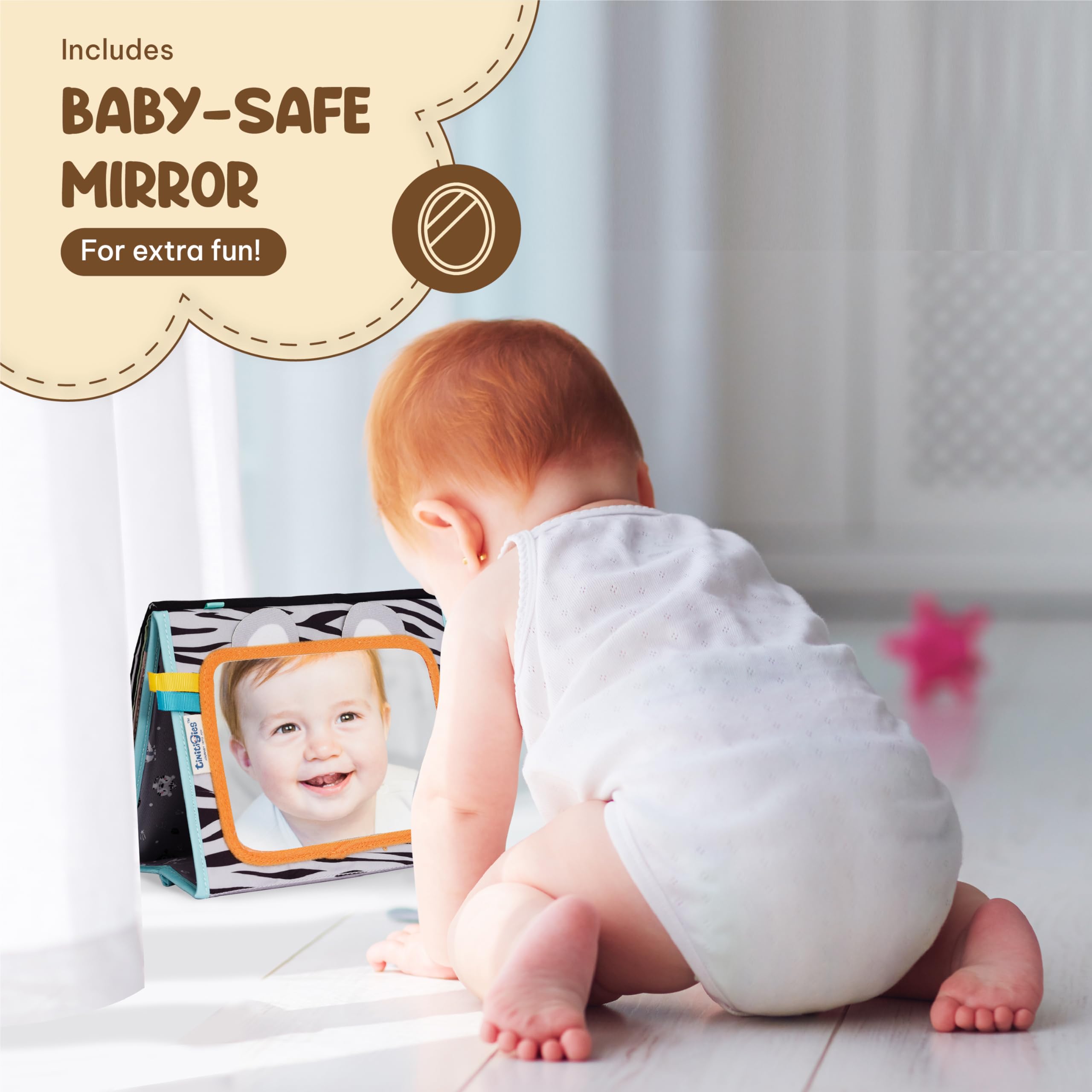 TINITIGIES soft fabric book offers gentle, safe infant play.
