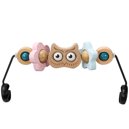 TinlyFinly owl wooden toy bar engages baby visually in the Baby Bjorn bouncer