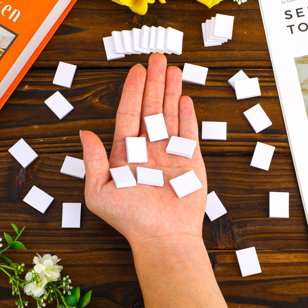 Tinoaly customizable miniature book for personalized storytelling in setups.