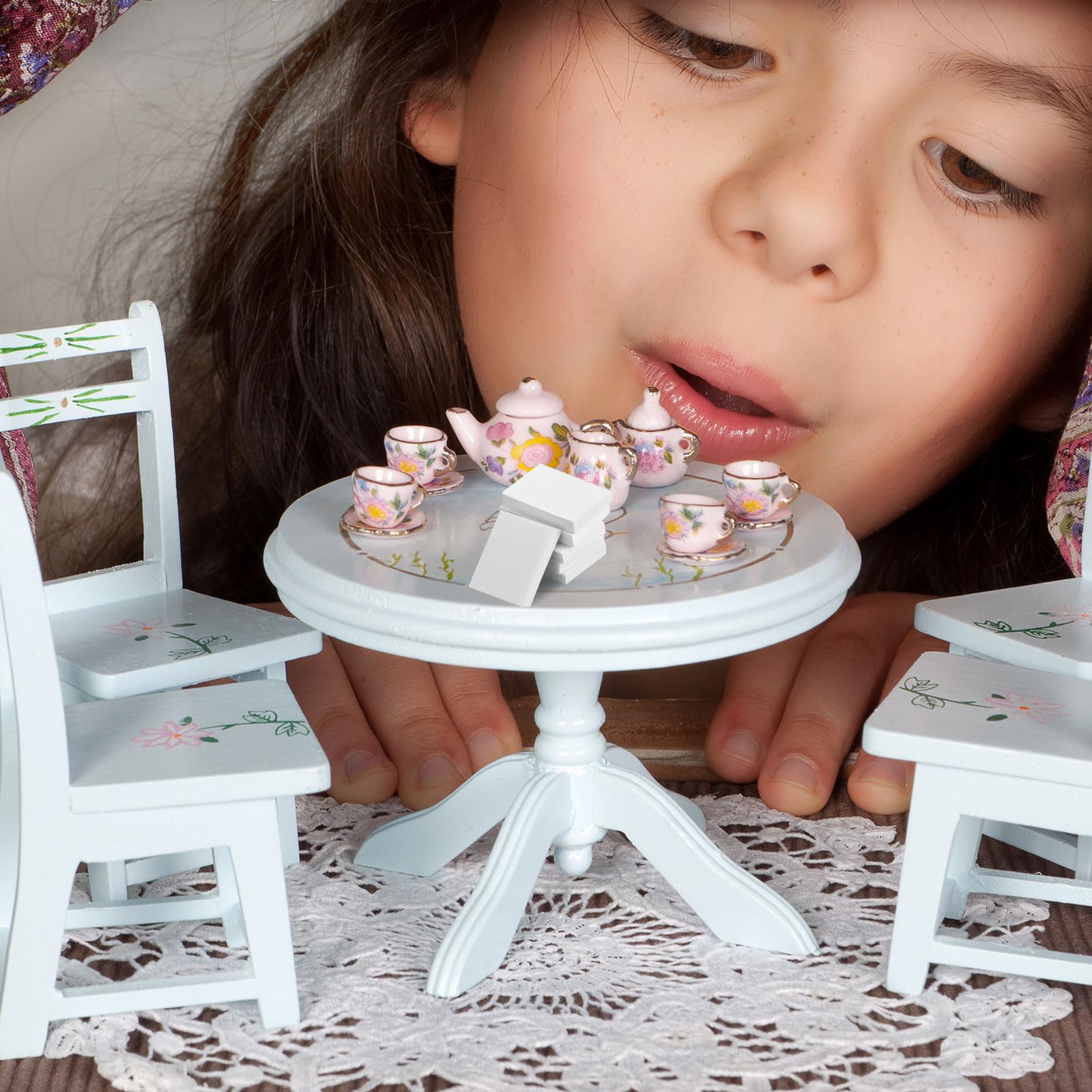 Tinoaly miniature book as a thoughtful dollhouse gift idea.