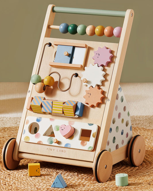 Tiny Land Morandi Walker with mirror supports curious exploration during first steps.