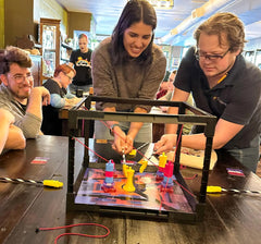 Tiny Laser Heist money pile signals endgame rewards and competition