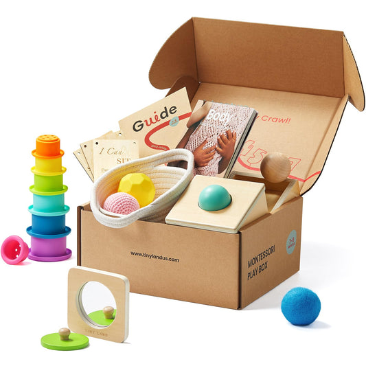 Tiny Land object permanence box fosters early cause-and-effect exploration for babies.