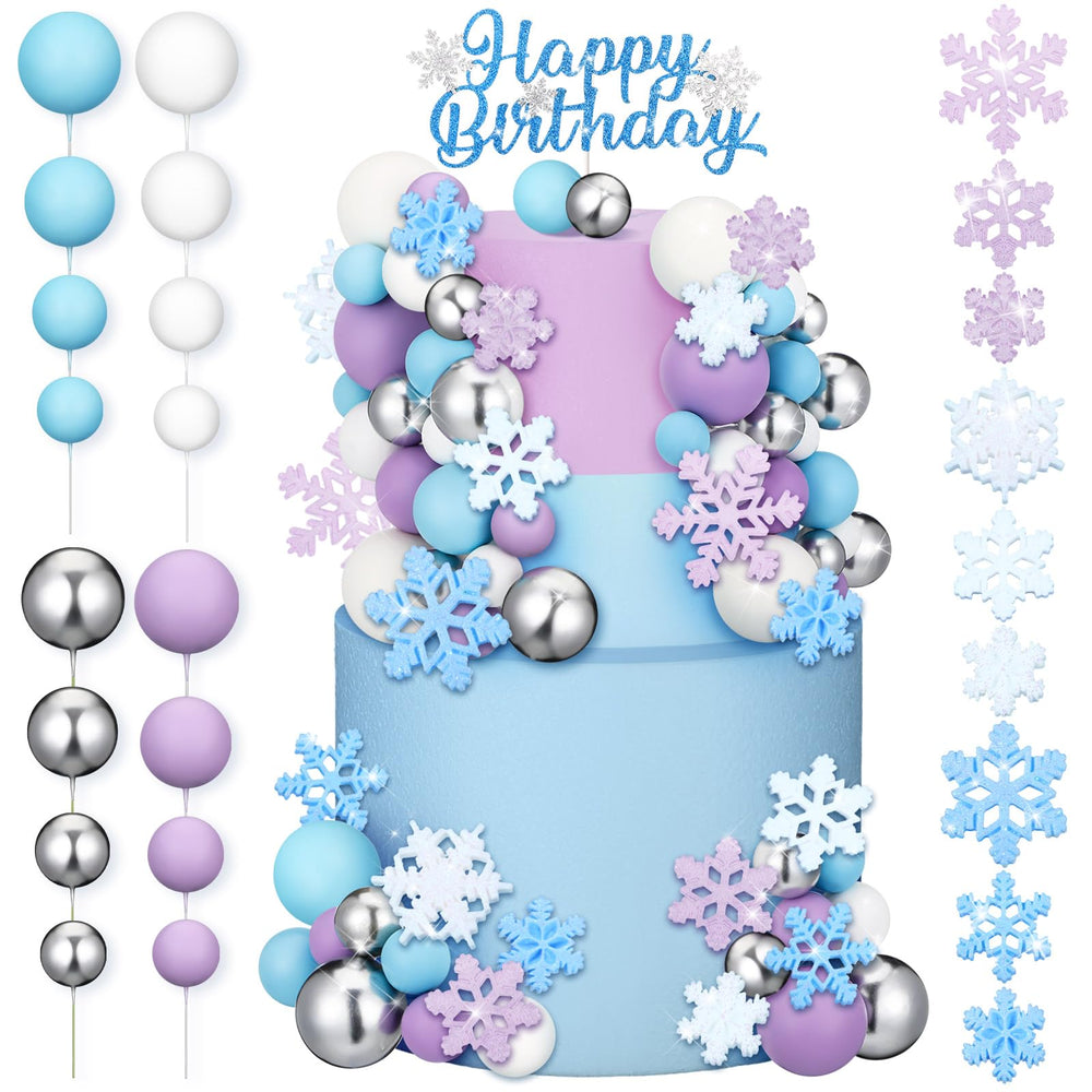 Tioncy snowflake cake topper set with toppers and balls enhances a festive winter birthday cake.