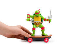 Michelangelo figure pose from TMNT Sewer Shredders for upbeat play