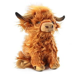Toaje Highland Cow plush companion doubles as a soft cushion for seating.