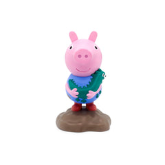 Tonies George figure resting on Toniebox for easy storytelling sessions.