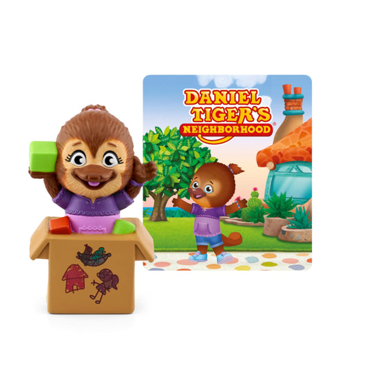 Tonies Jodi Platypus figurine beside Daniel Tiger scene for imaginative storytelling.