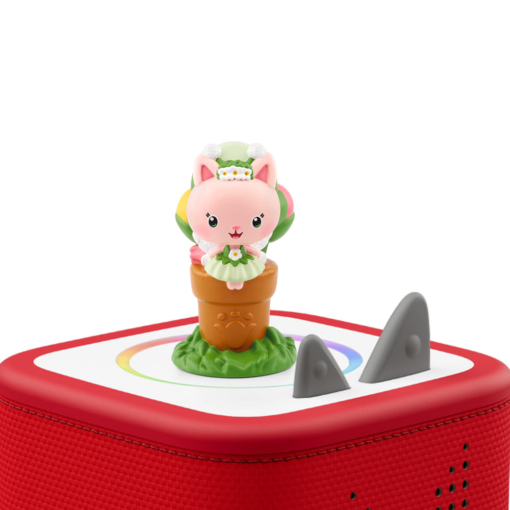 Kitty Fairy in garden sleepover scene promotes creative play.