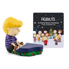 Tonies Peanuts Charlie Brown figurine ready for cozy holiday listening sessions.
