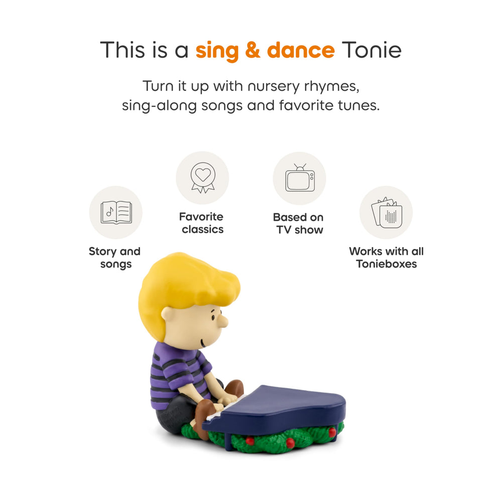 Tonies Peanuts packaging with Christmas decor creating holiday ambiance.