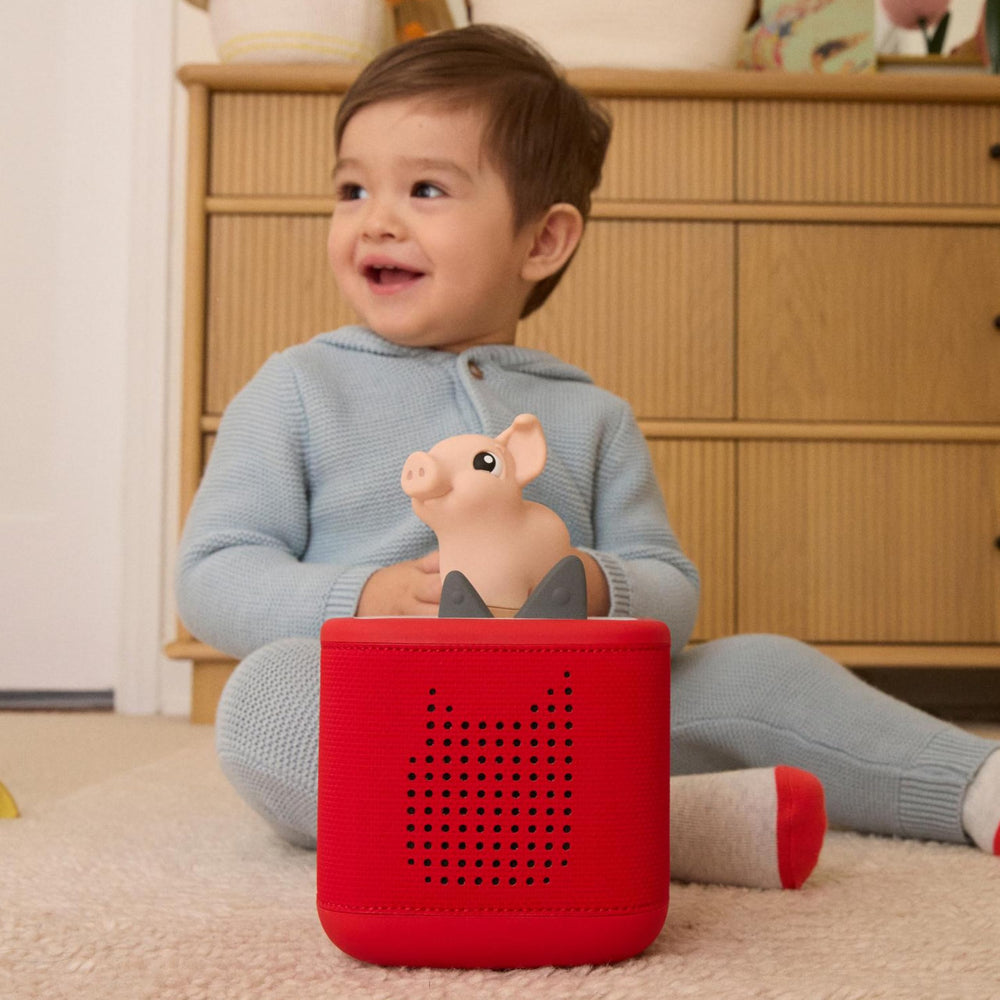 Tonies Pig Sound image emphasizes hearing oinks and snuffles during play.