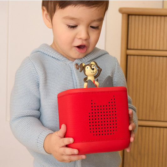 Tonies Toniebox 2 Sunset Red side view shows compact, durable design for family spaces.
