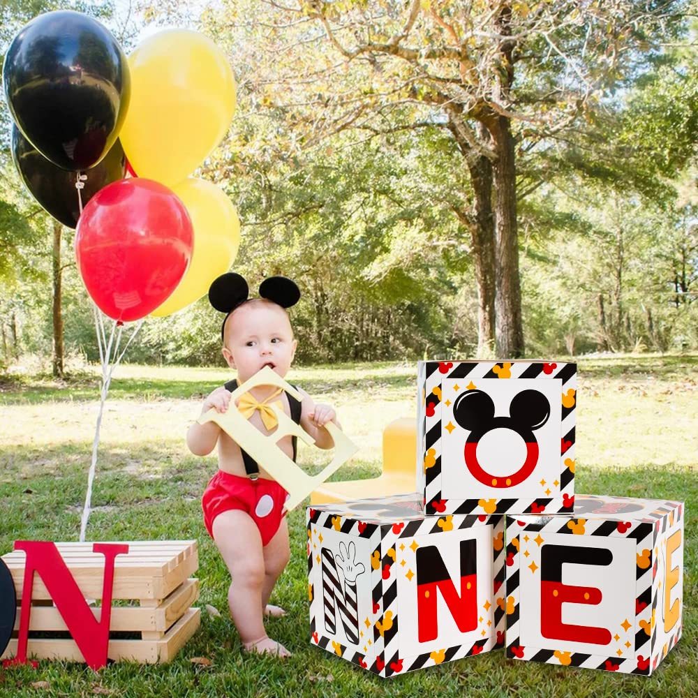 TONIFUL first birthday decoration with red, black, and yellow accents.