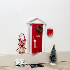 Tonttuovi miniature elf door set adds whimsical touch to displays.