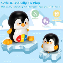 TooyBing penguin mom rotates flippers and lights for visual stimulation.