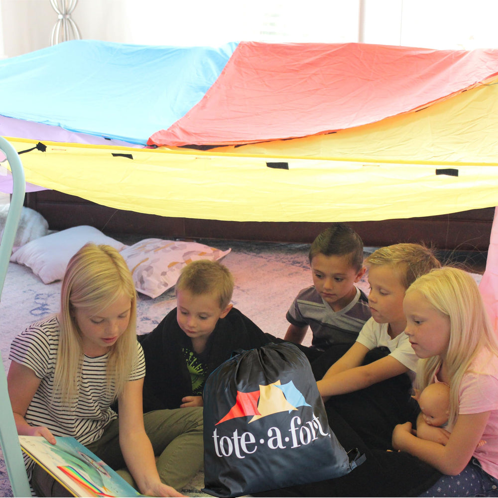 Tote a Fort indoor outdoor playset promotes collaborative building during playdates.