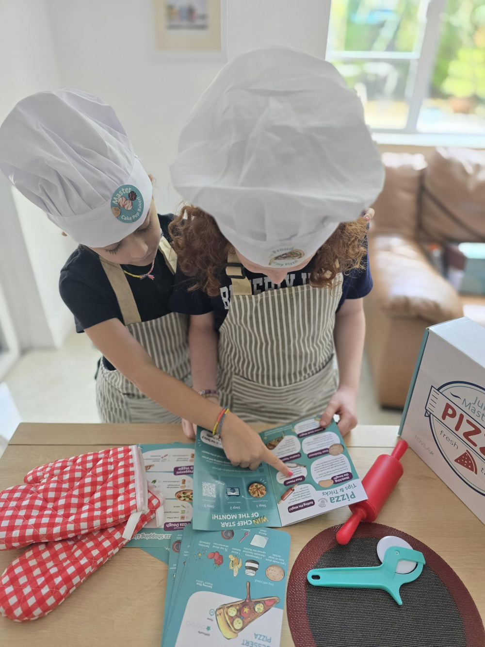 TOVLA JR chef hat adds fun, authentic kitchen role-play.