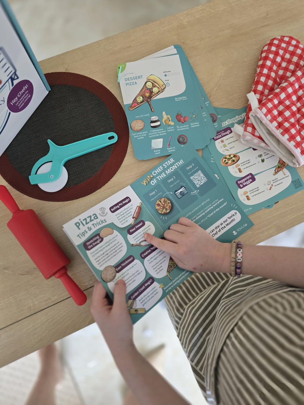 TOVLA JR stickers inspire personalized, colorful pizza creations.