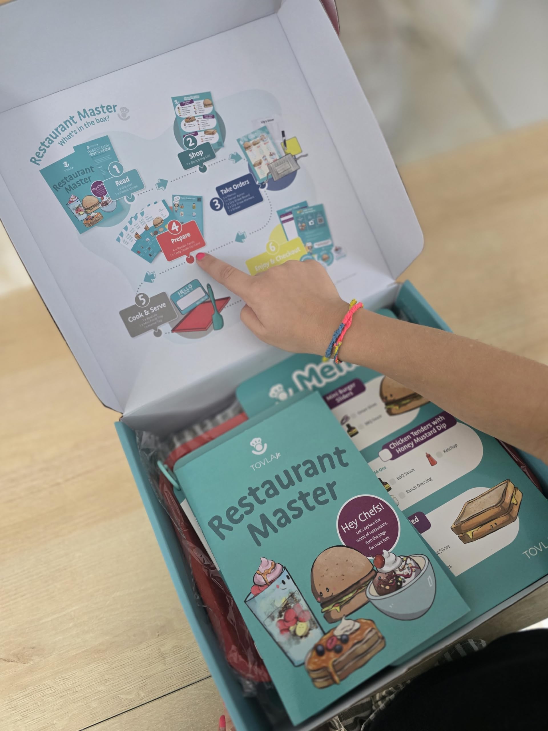 Tovla Jr. shopping list helps planning ingredients for hands-on pretend meals.