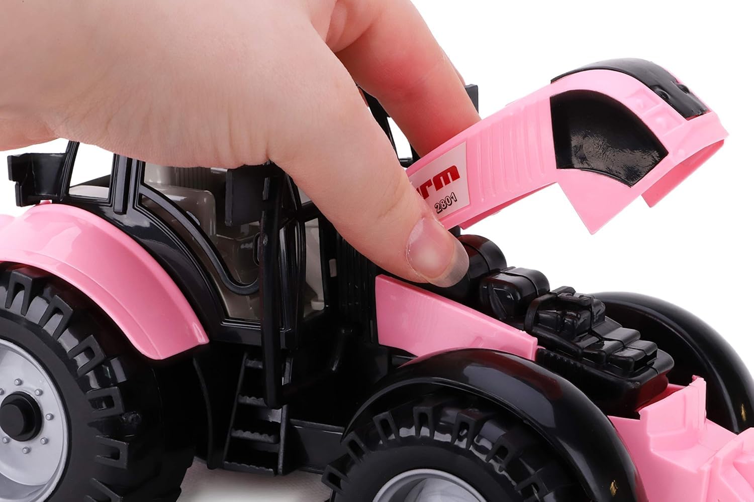 Toyland Friction-Powered Farm Tractor close-up pink reveals bonnet detail for curious hands.