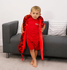 Toyland giant plush snake bedtime companion promotes imaginative play.
