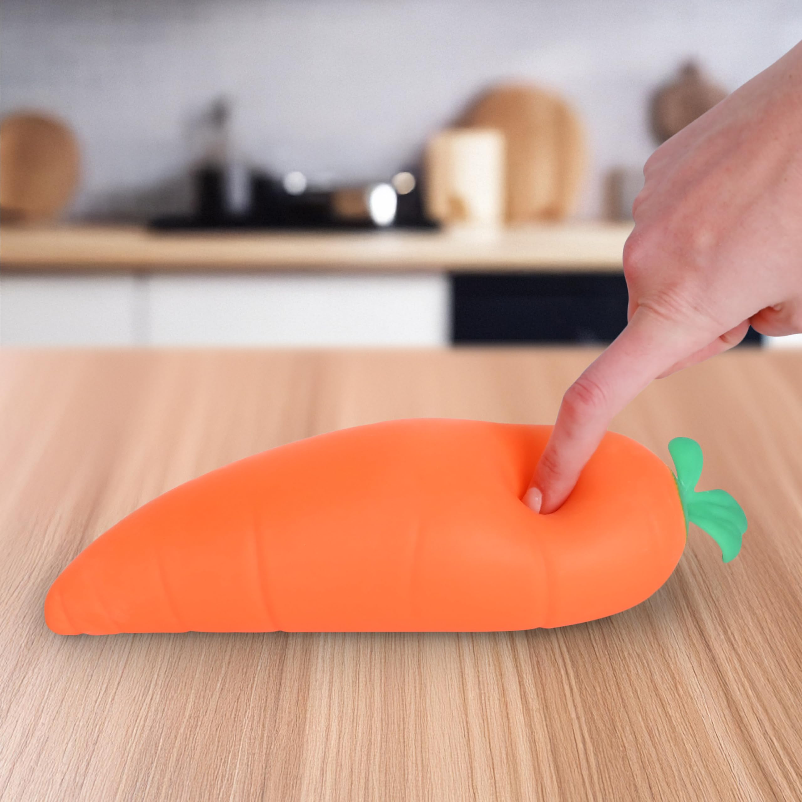 Sunny Days Entertainment carrot on desk offering fidget relief and cheerful decoration