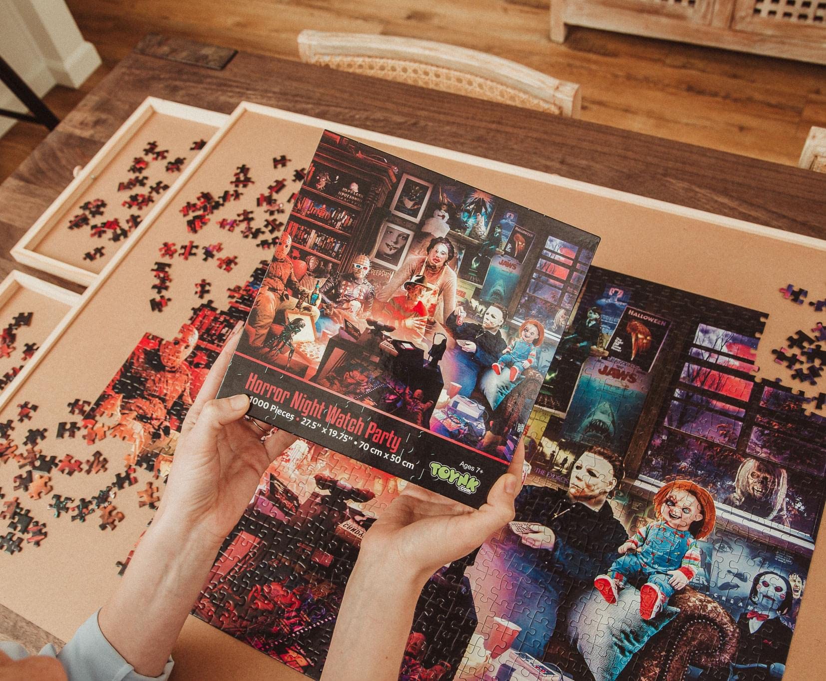 Toynk completed puzzle measures 28 by 20 inches, ideal for wall display.