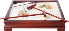 Toysmith Deluxe Zen Garden ceramic cranes add calm visual interest on a desk.