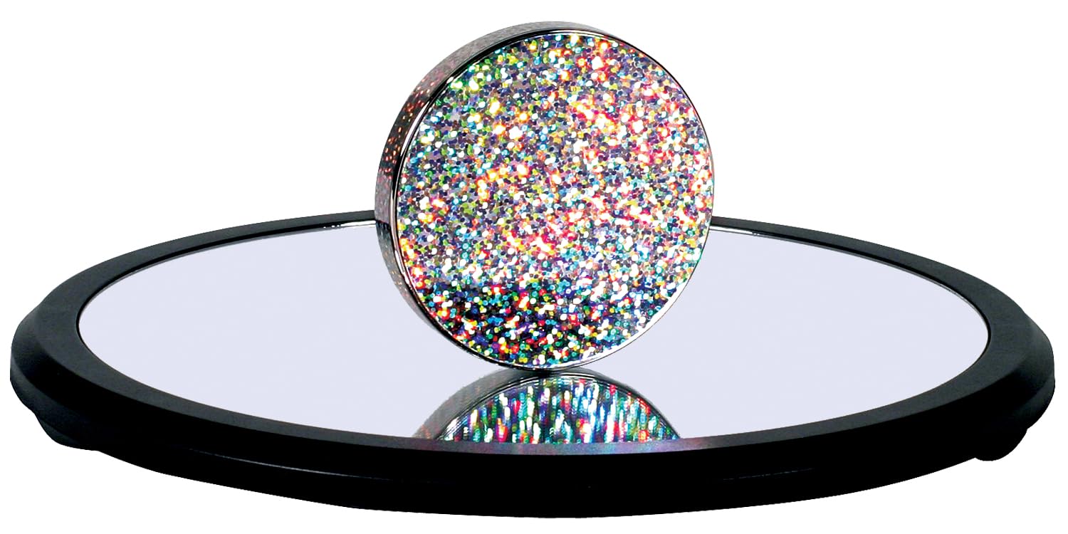 Concave nine-inch mirror provides a stable surface for focused desk aesthetics.