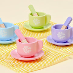 Toyssa wooden kitchen accessories complete a cohesive pretend kitchen setup.
