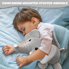 TOYSYM weighted elephant serves as a comfy pillow during reading.