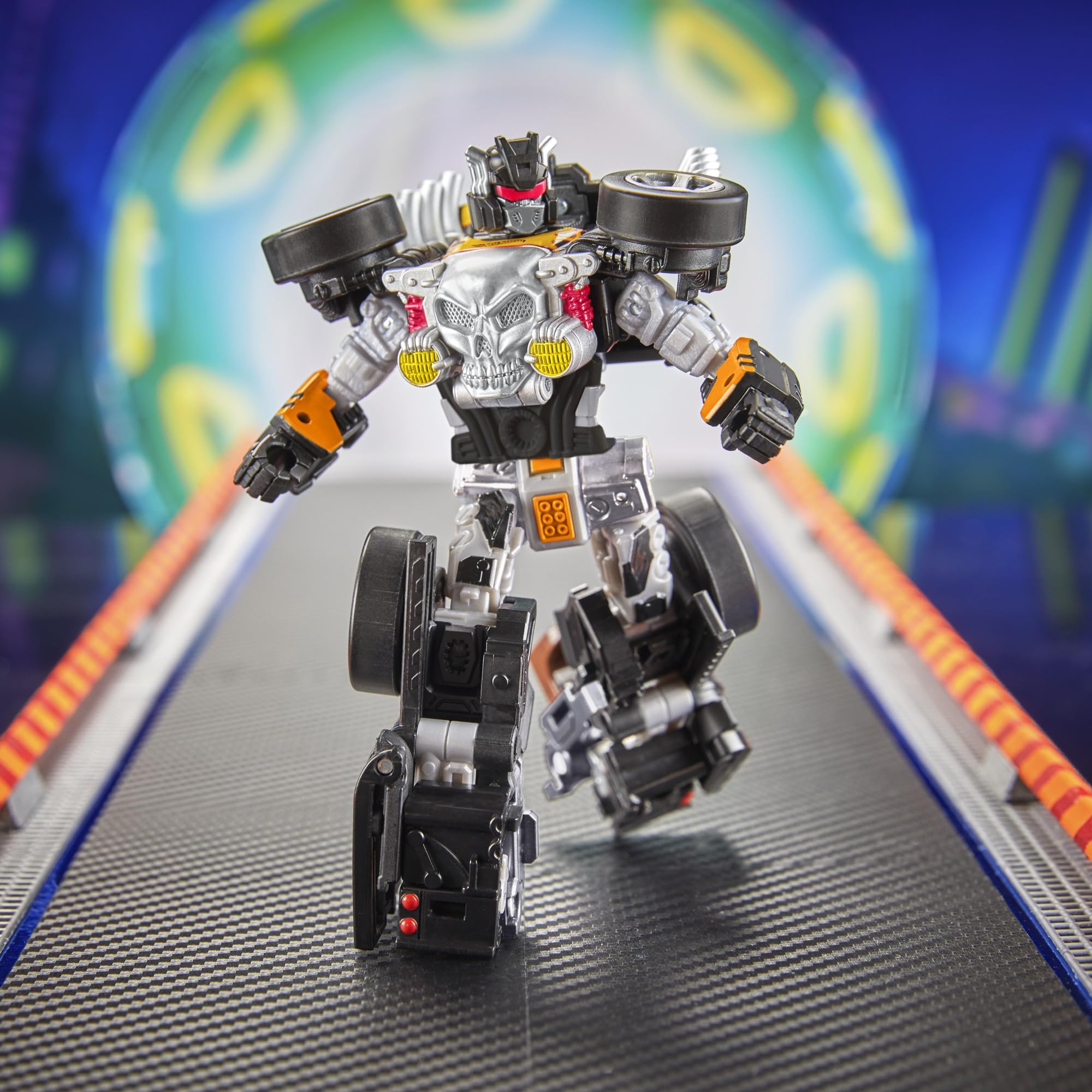 Transformers Hot Wheels Bone Shaker car mode showcases flame deco and skull grille.