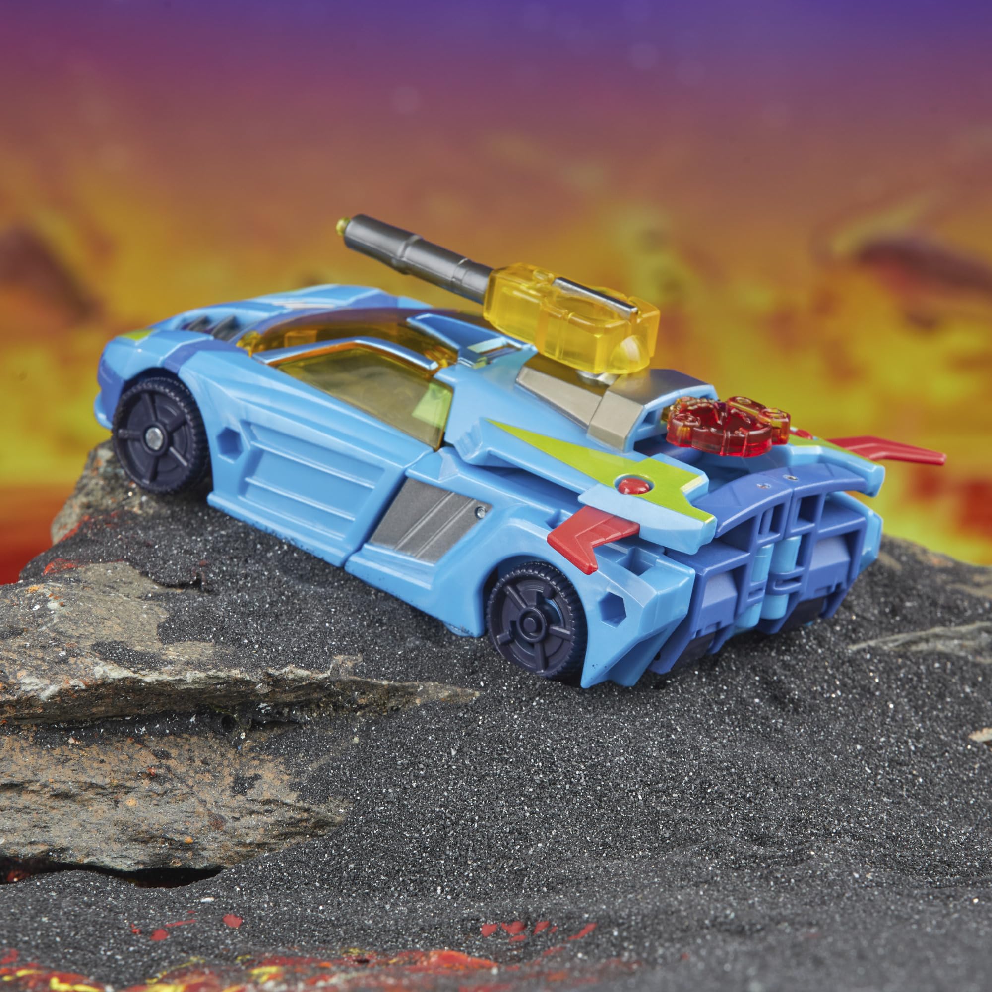 Transformers Legacy Hot Shot articulated arms support wide action poses.