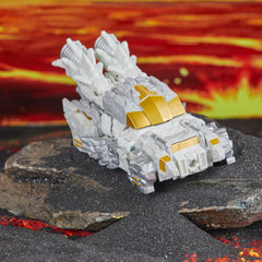 10-step transformation sequence from rock creature to car