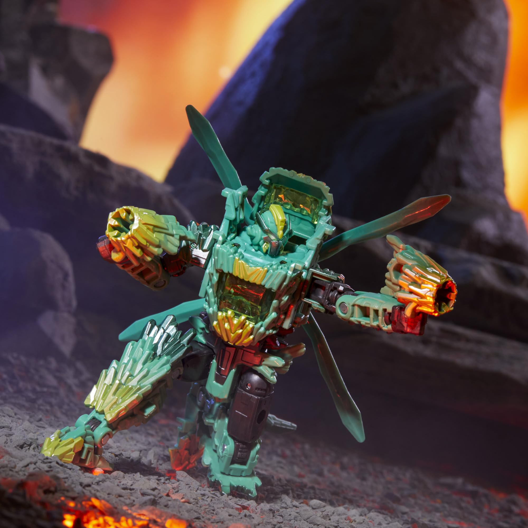 Transformers Infernac Shard blaster accessory included for action poses.