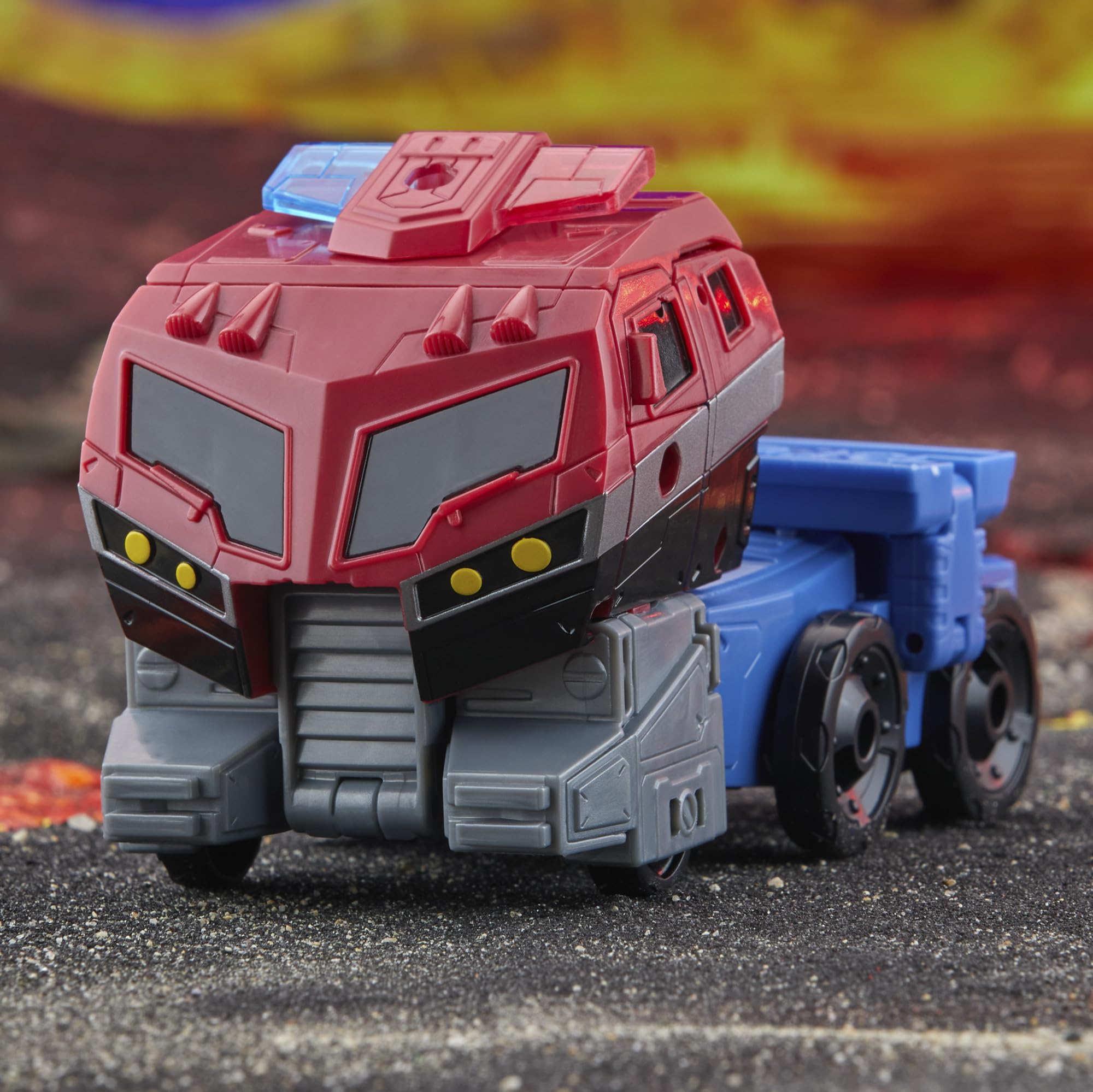 Transformers Legacy United Optimus Prime animated truck mode highlights 25-step conversion.