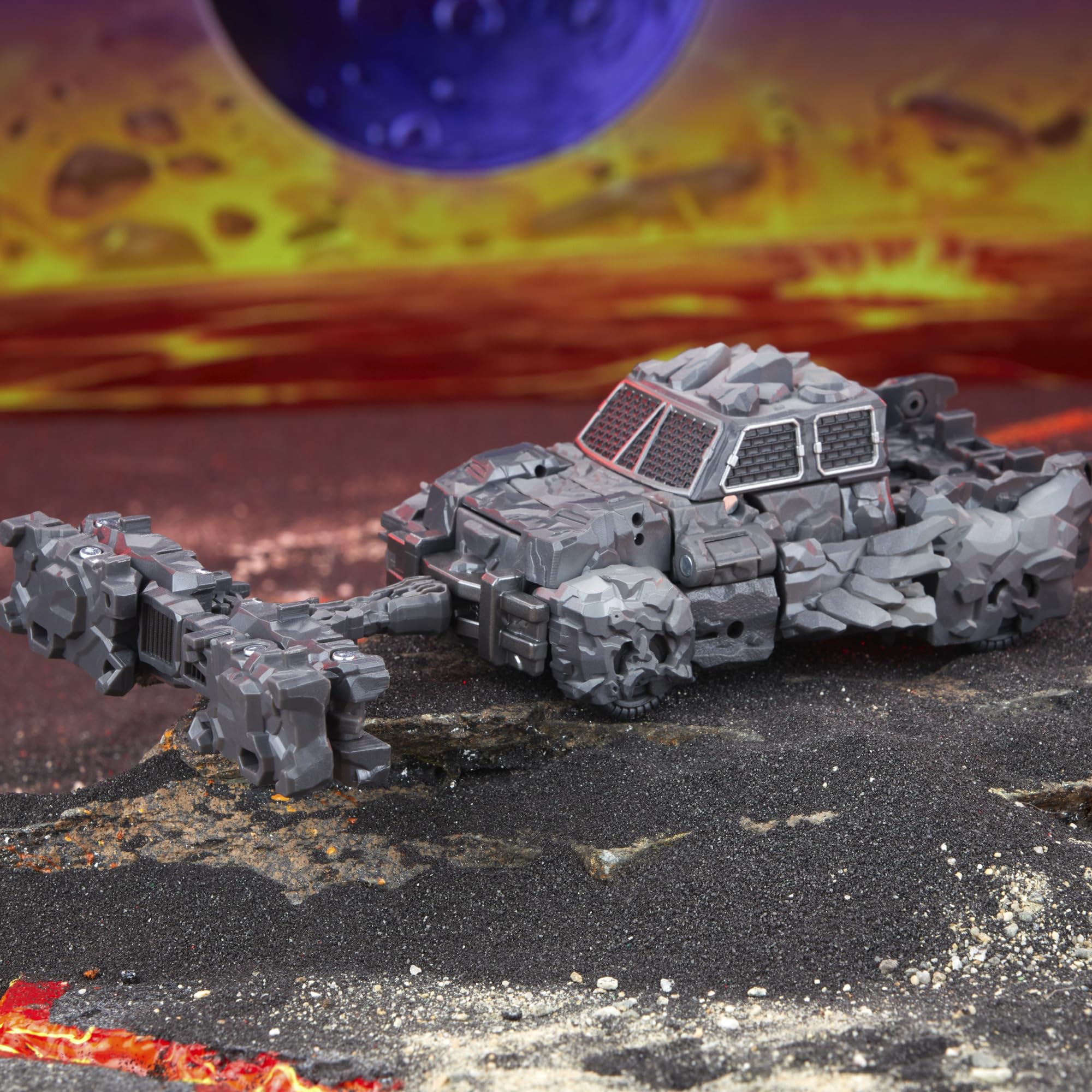 Transformers Magneous packaging reflects Infernac Universe storytelling.