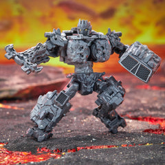 Transformers Magneous rock axe accessory is included for action-ready poses.