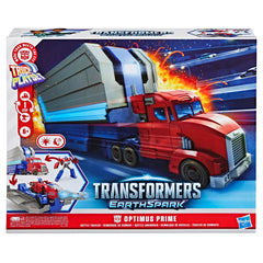 Transformers Optimus Prime battle trailer opens into battle station with engaging sounds.