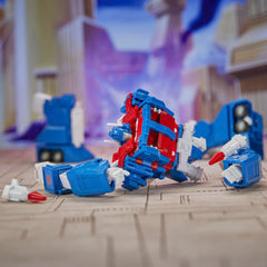 Backdrop of Battle of Autobot City enhances cinematic display.