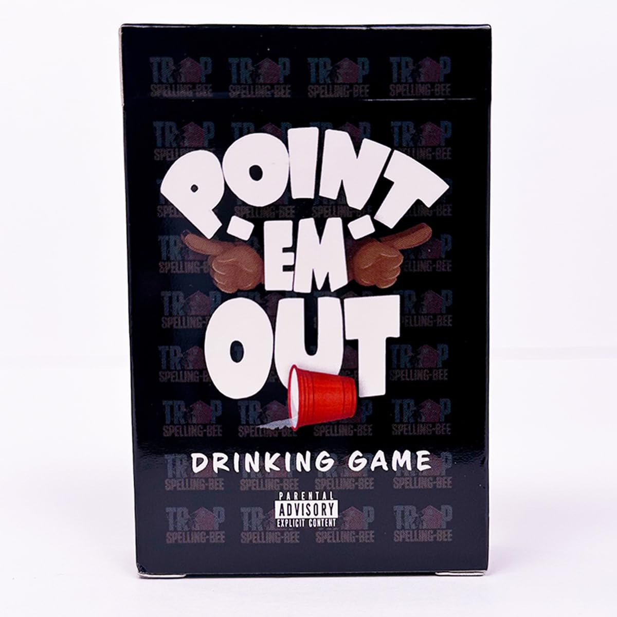 Trap Spelling Bee Point Em Out card deck on a lively party table showing social play