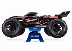 Traxxas 8796 blue RC stand with foam pads protects tires and surfaces.