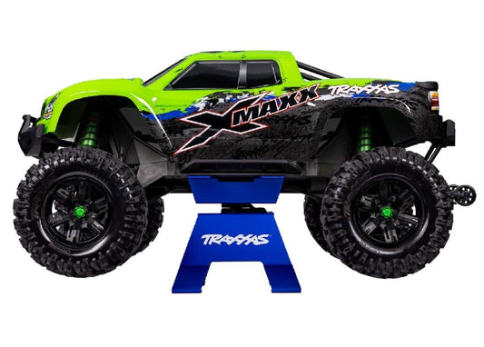 Traxxas X-Maxx XRT stand demonstrates compatibility for stable support during repairs