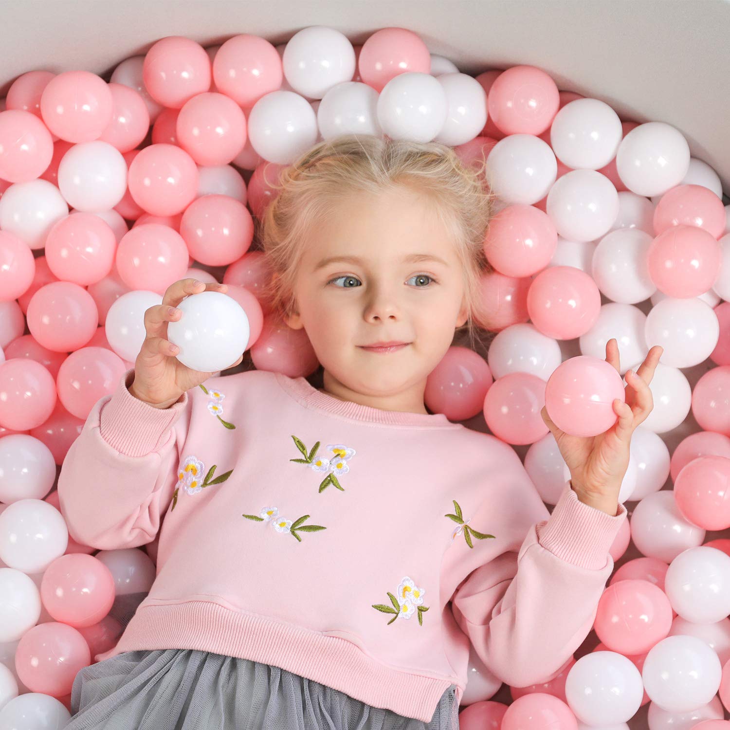 TrendBox ball pit balls filling a small play pit with bright hues.