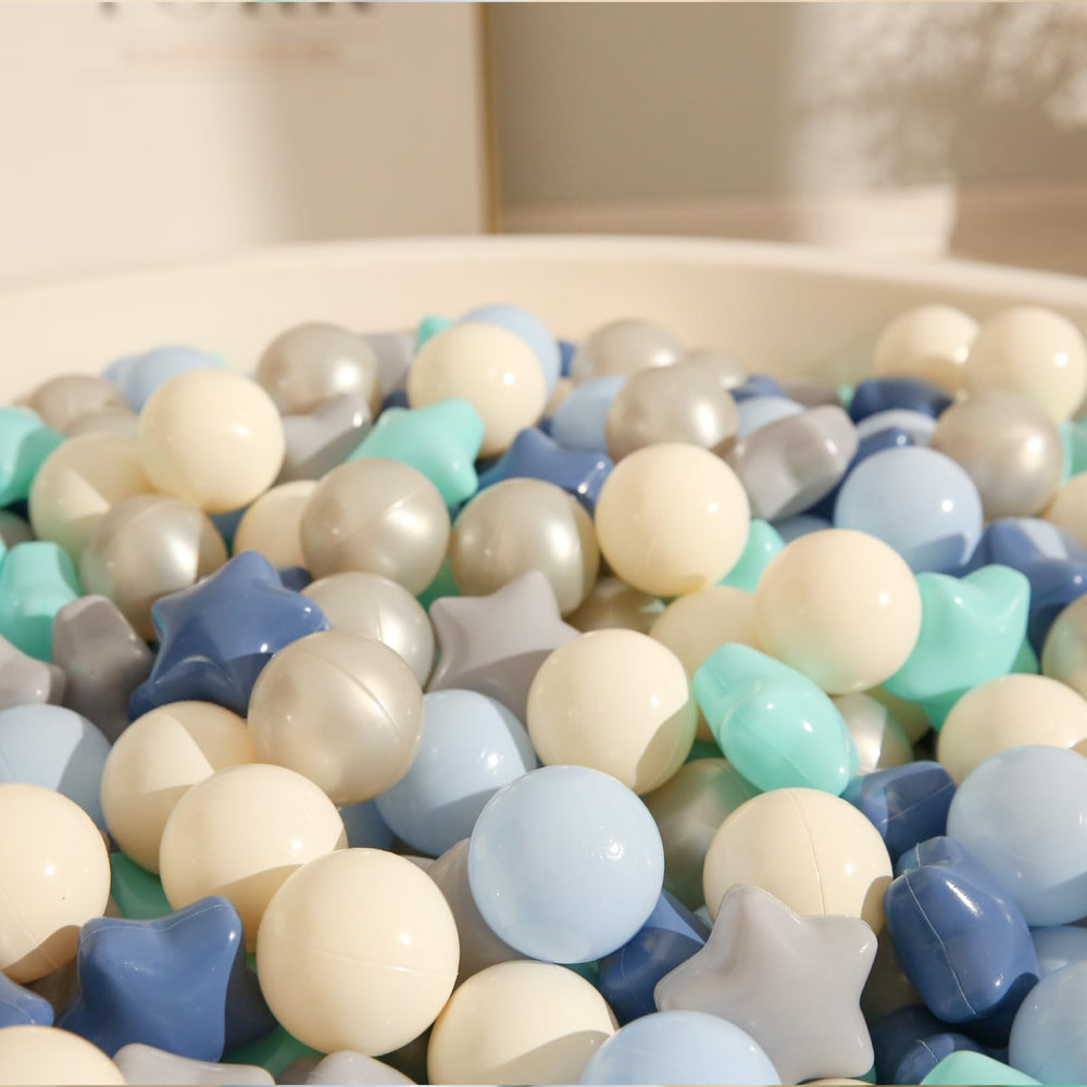 TRENDPLAY Toddlers enjoy color counting with star balls.