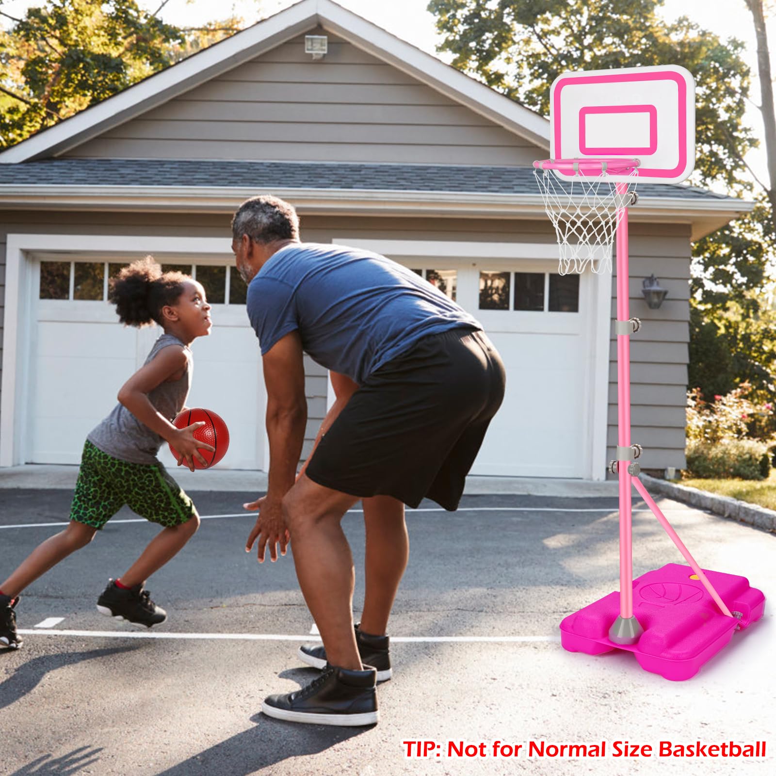 Children playing with Tsomtto pink hoop, showcasing child-friendly play
