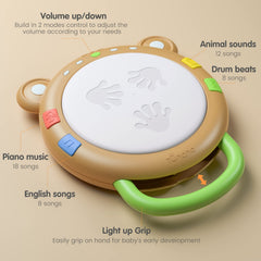 TUMAMA KIDS LED light toy drum close-up showing flashing lights